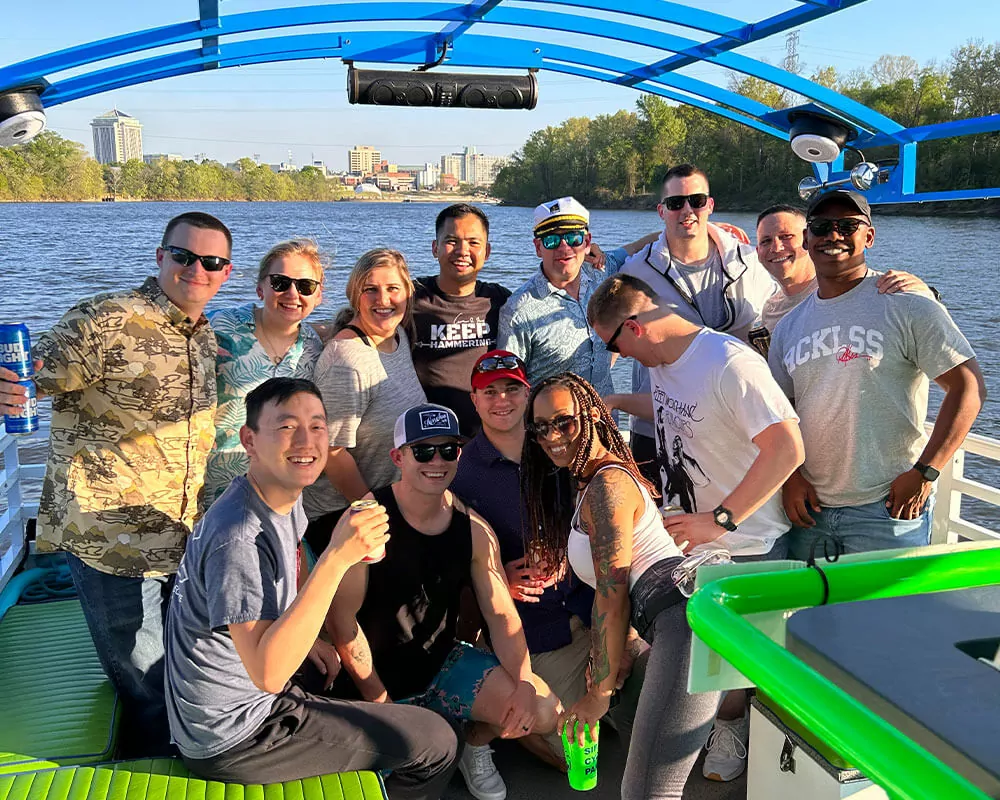 group photo of friends and family on a pedal cruise